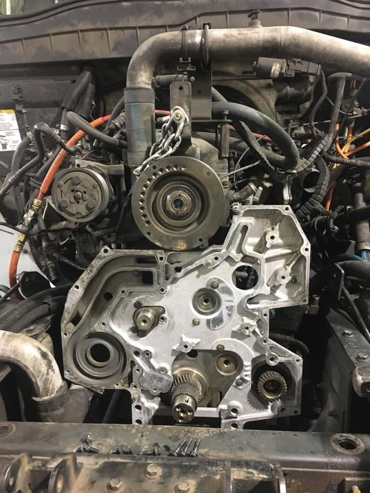 Engine front cover and timing components