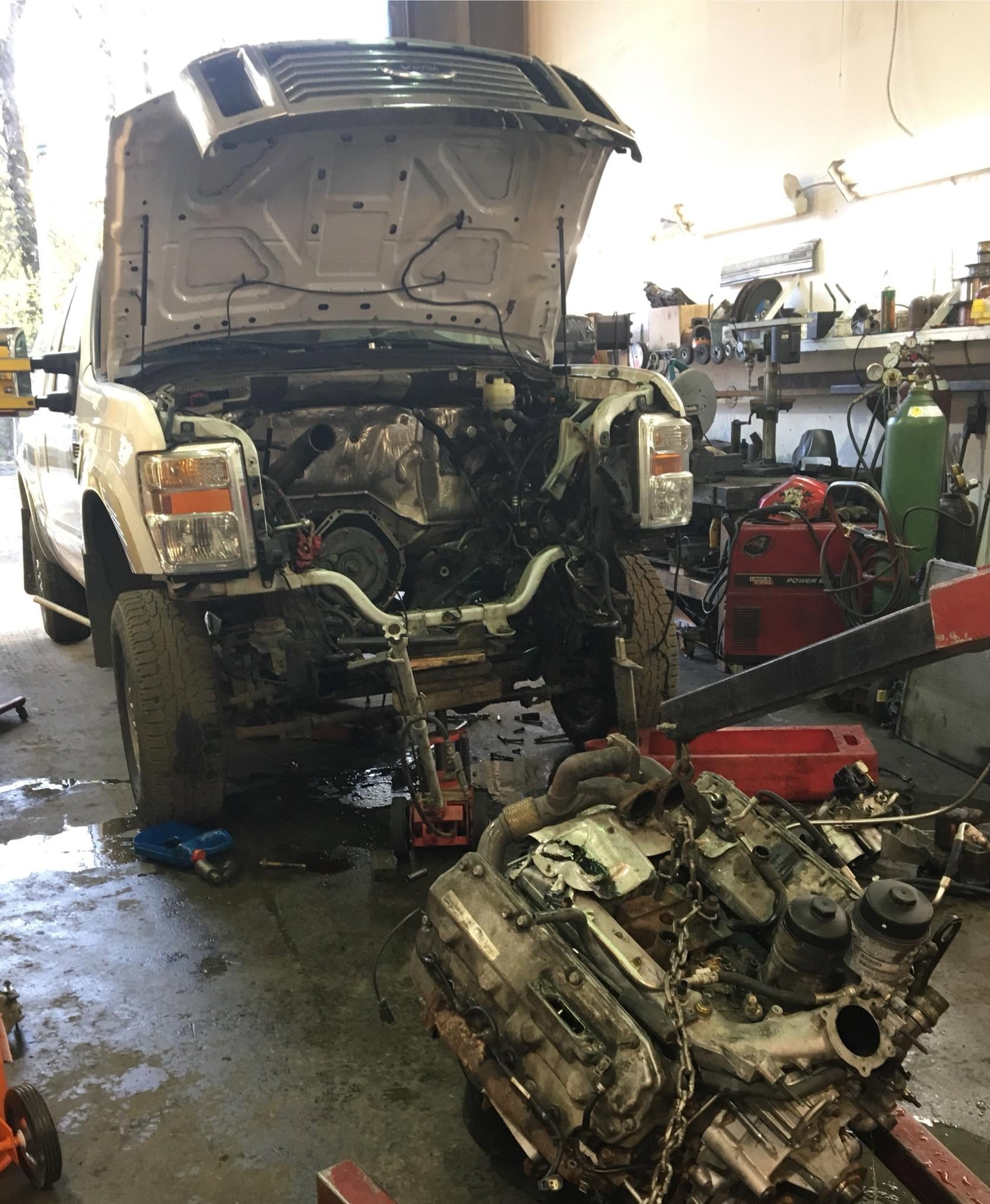 Engine removal in shop bay