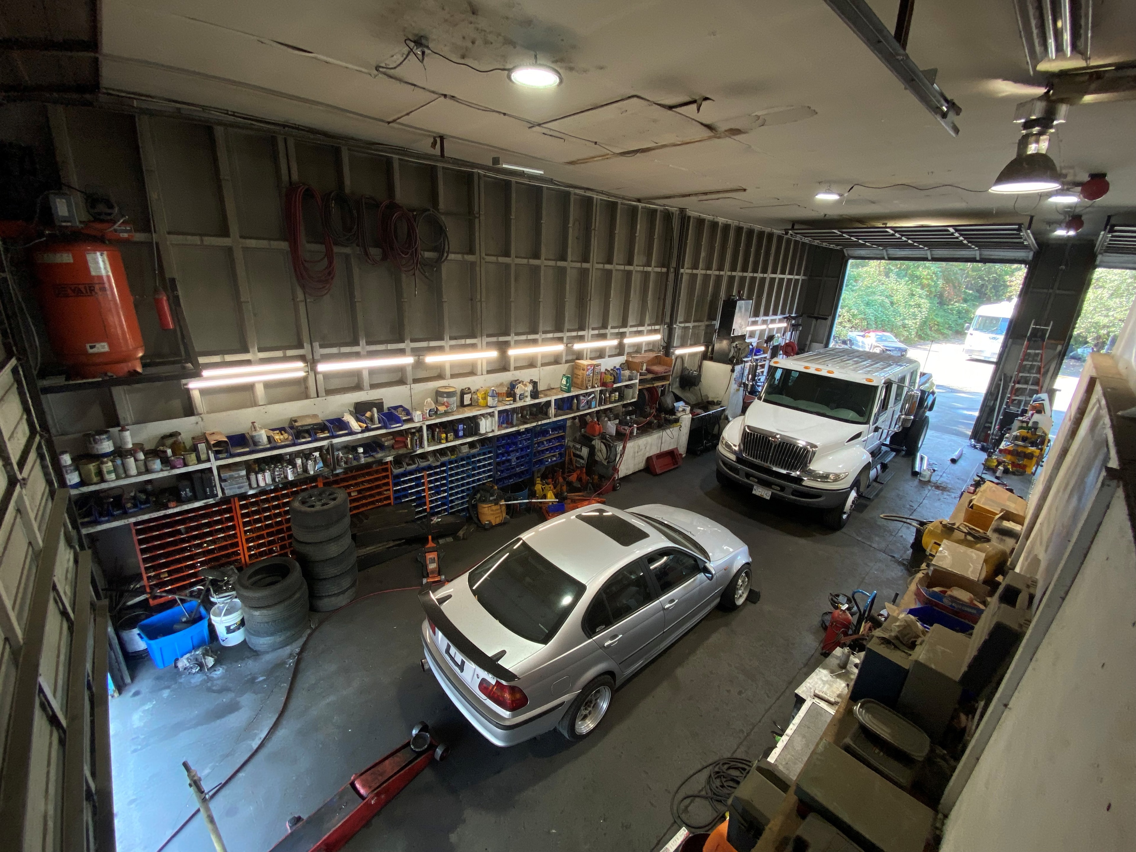Inside the shop with BMW and International truck